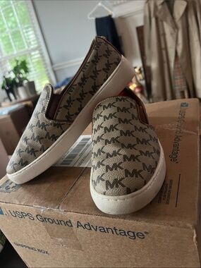 Michael Kors Beige/Tan MK Monogram Slip-On Sneakers.  Size 7.5
